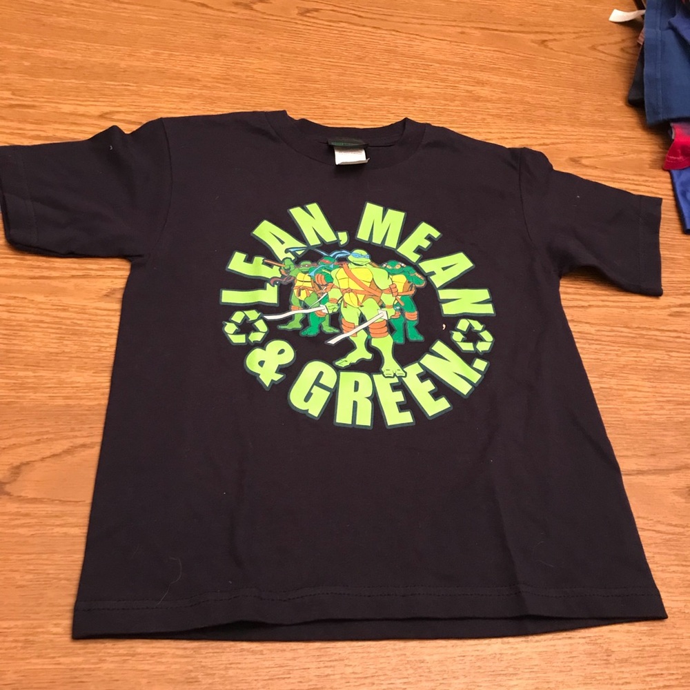Turtle shirt, short Sleeve.                    215